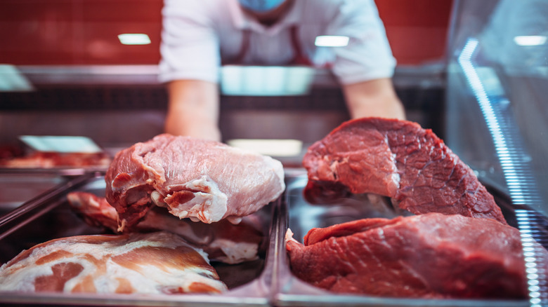 Meats at butcher counter