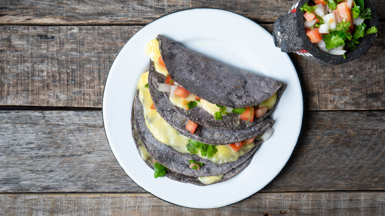 blue corn tacos on a plate