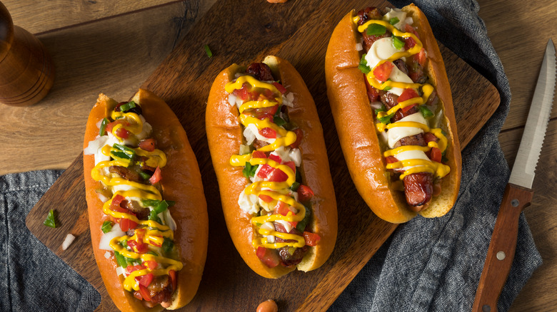 Sonoran hot dogs on a board