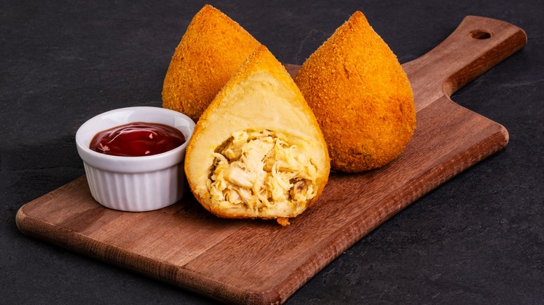 Coxinha on wooden board