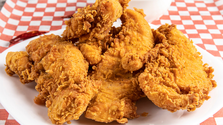 Pile of fried chicken on plate