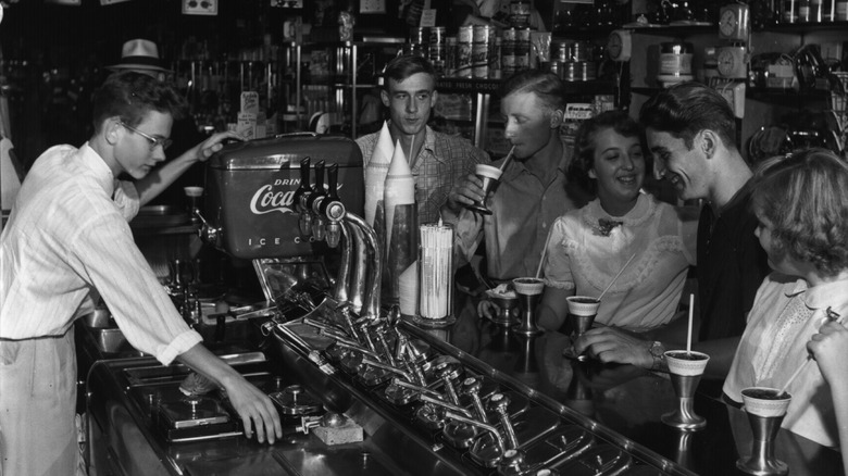 teens at soda fountain