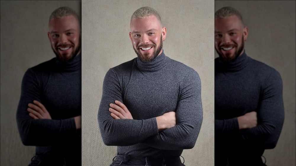 John Whaite dressed in a gray turtleneck