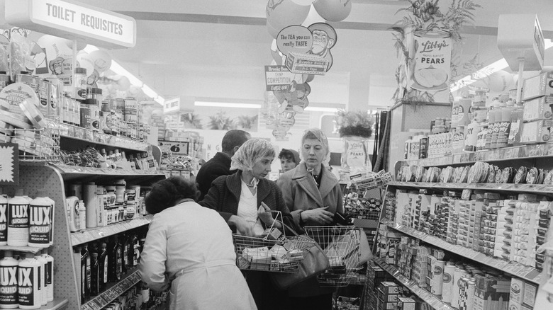 women crowded into supermarket