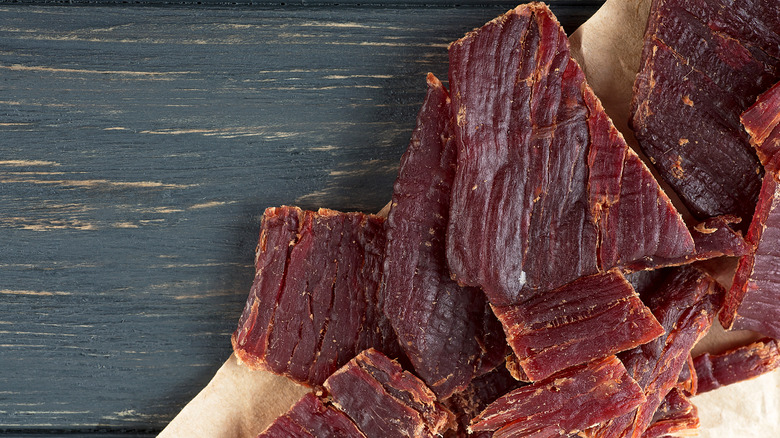 Beef jerky on a wooden board