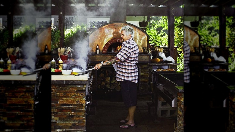 Guy Fieri stir frying 