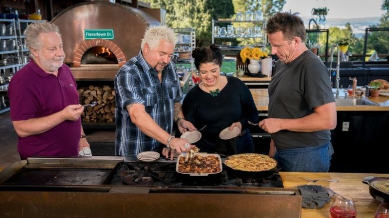 Jonathan Waxman, Guy Fieri, Alex Guarnaschelli, and Marc Murphy in his kitchen