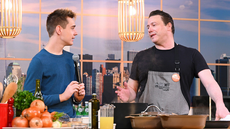 Rocco DiSpirito cooking at a public event