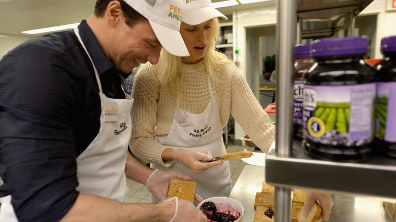 Rocco DiSpirito having fun in the kitchen with Karolina Kurkova