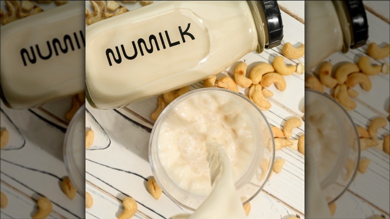 Numilk bottle and glass of milk