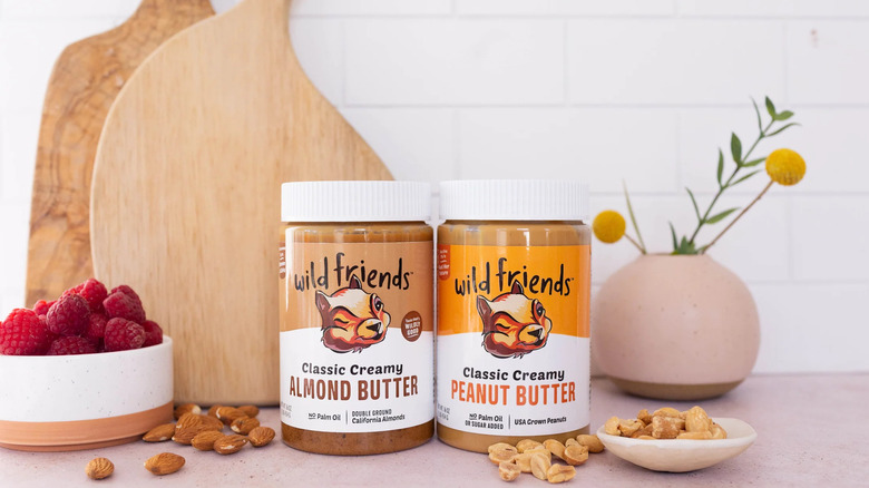 Jars of peanut and almond butters