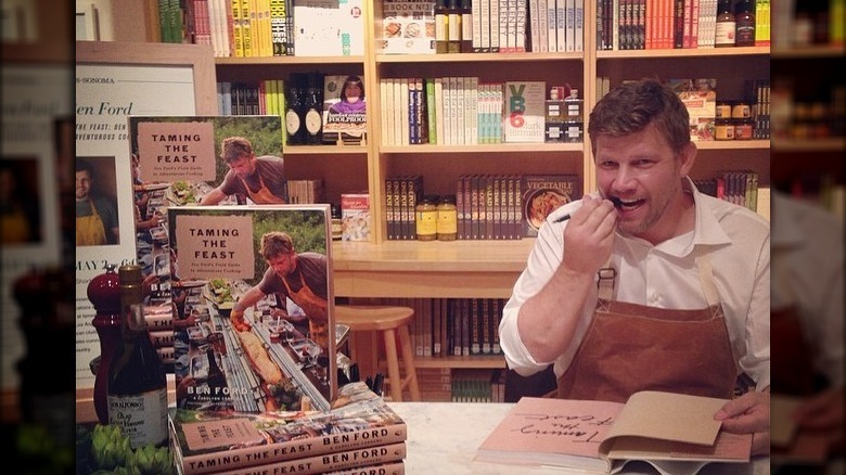 Chef Ben signing his cookbook