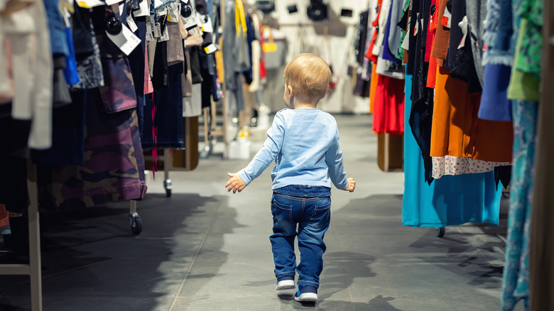 Child alone in store aisle