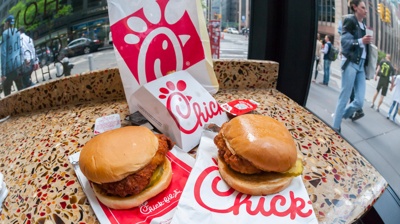 Chick-fil-A sandwiches on brown tabletop