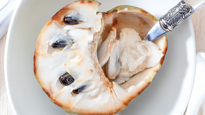 Cherimoya on a white plate