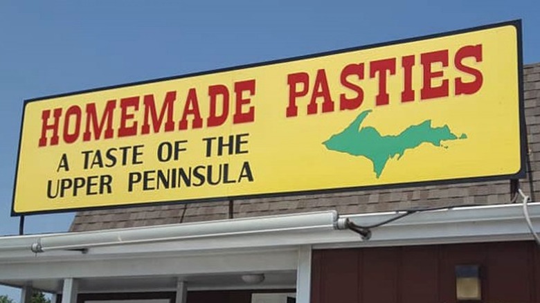 Yellow and red pasties sign 