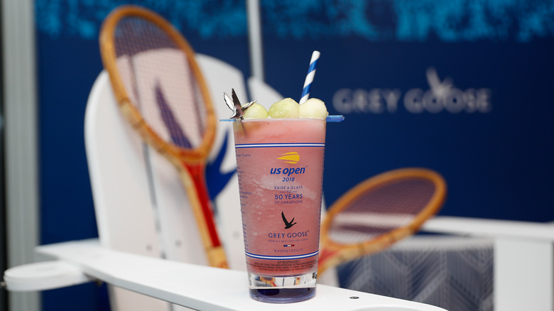 honey deuce at the US Open with tennis racket in the background