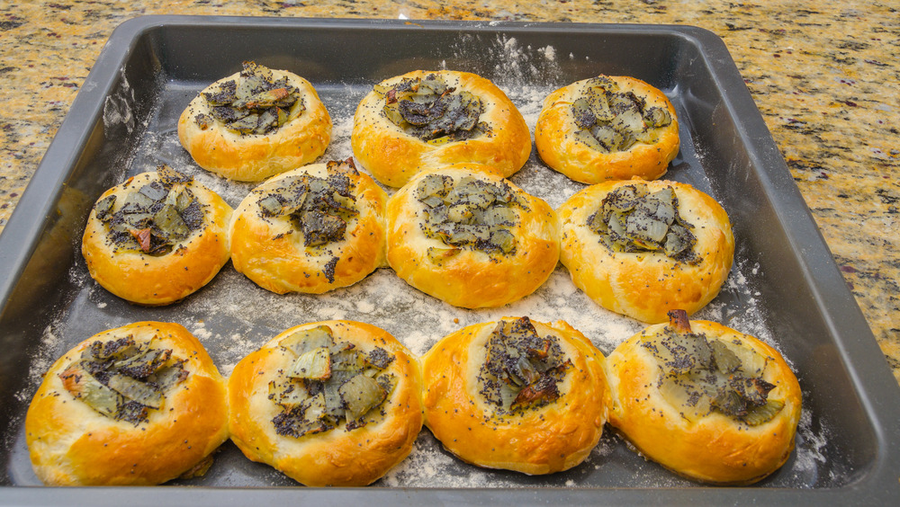 Homemade knishes in a baking tray