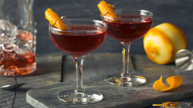 Two boulevardier cocktails on marble table