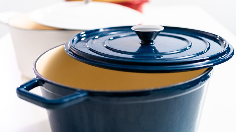 Blue Dutch oven pot with lid slightly ajar