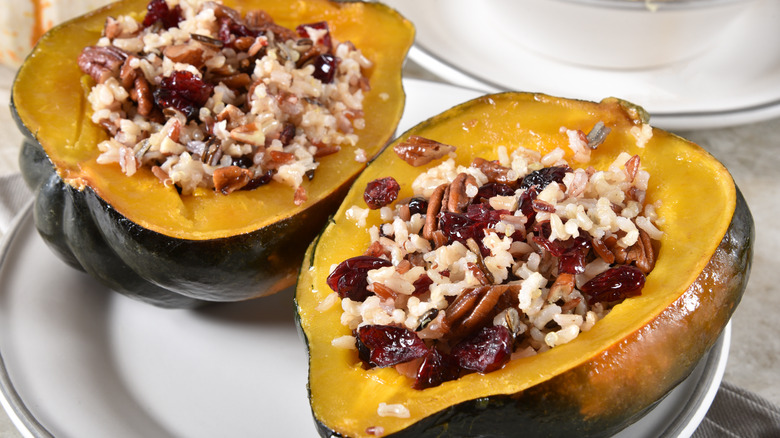 A pair of stuffed acorn squash