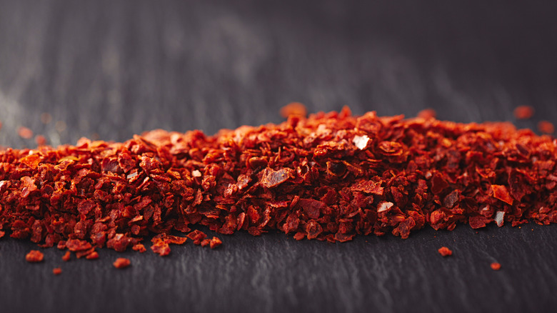 Aleppo pepper flakes arranged in line