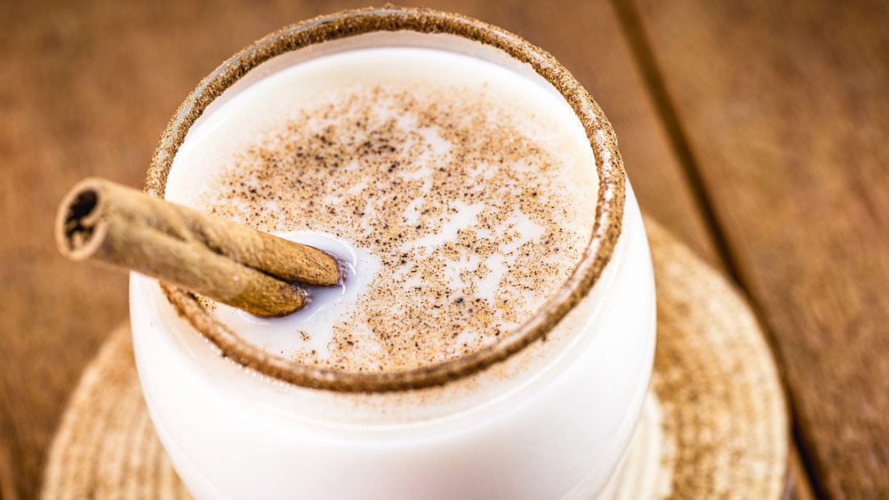 Cup of almond nog with nutmeg on top