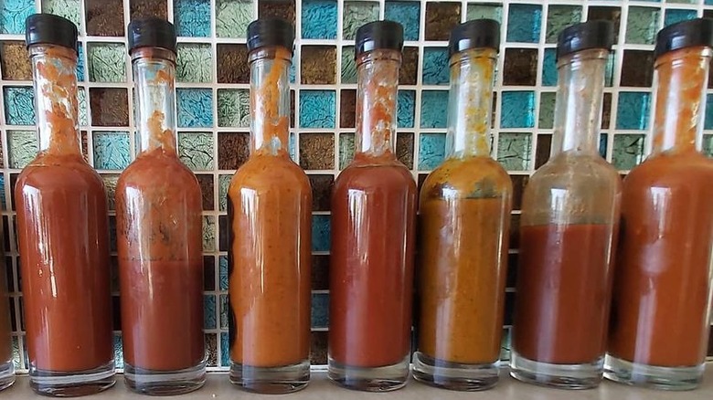 Bottles of ancho chile hot sauce