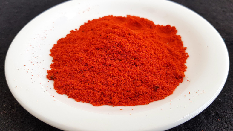 Annatto powder on a white plate 