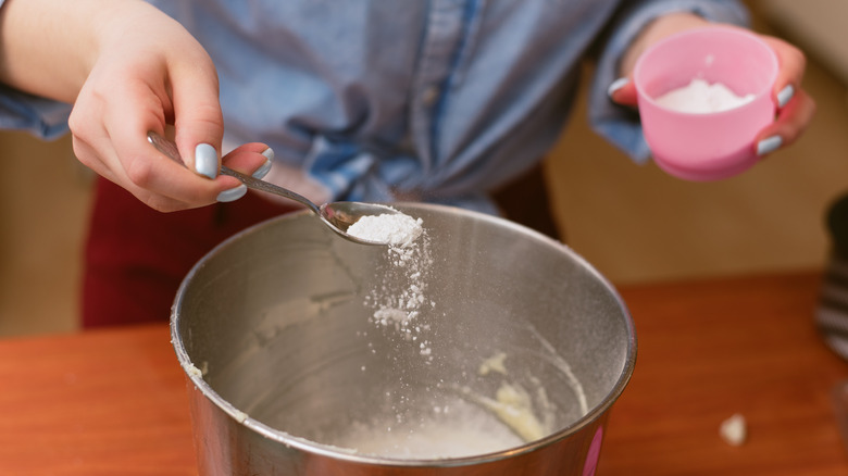 Baking powder added to bowl