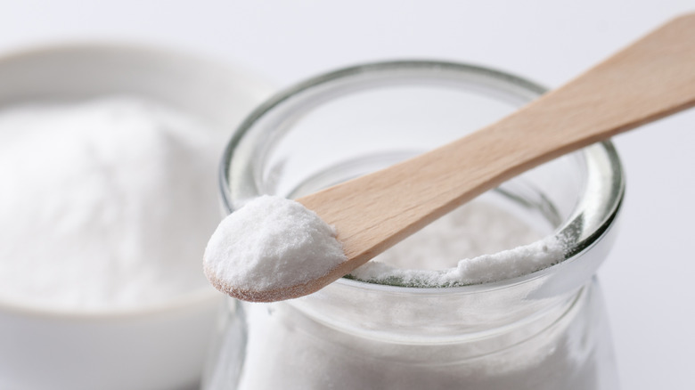 White powder on wooden spoon