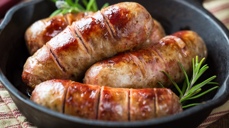 bangers in cast iron pan