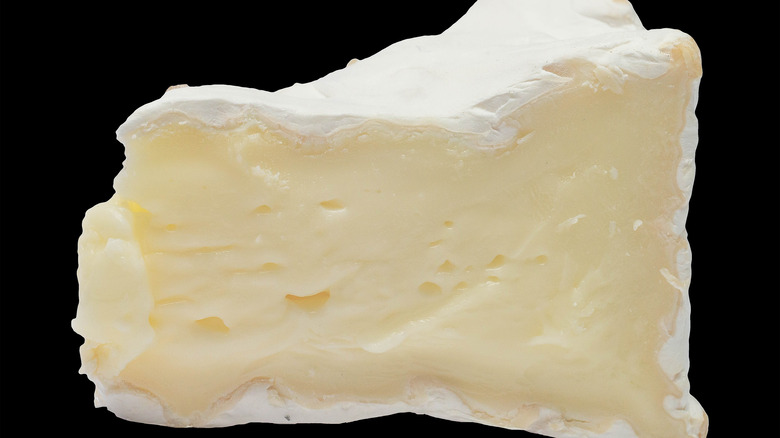 Closeup of wedge of Camembert cheese