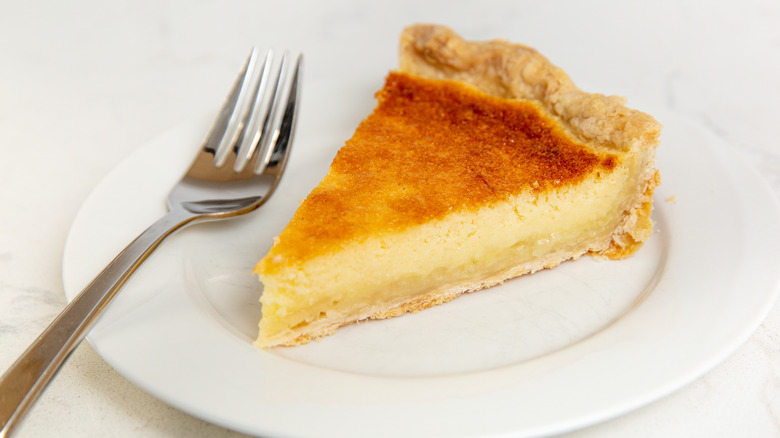 A slice of chess pie on a plate