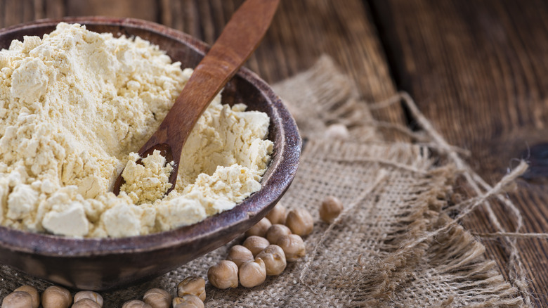 chickpea flour in wooden bowl