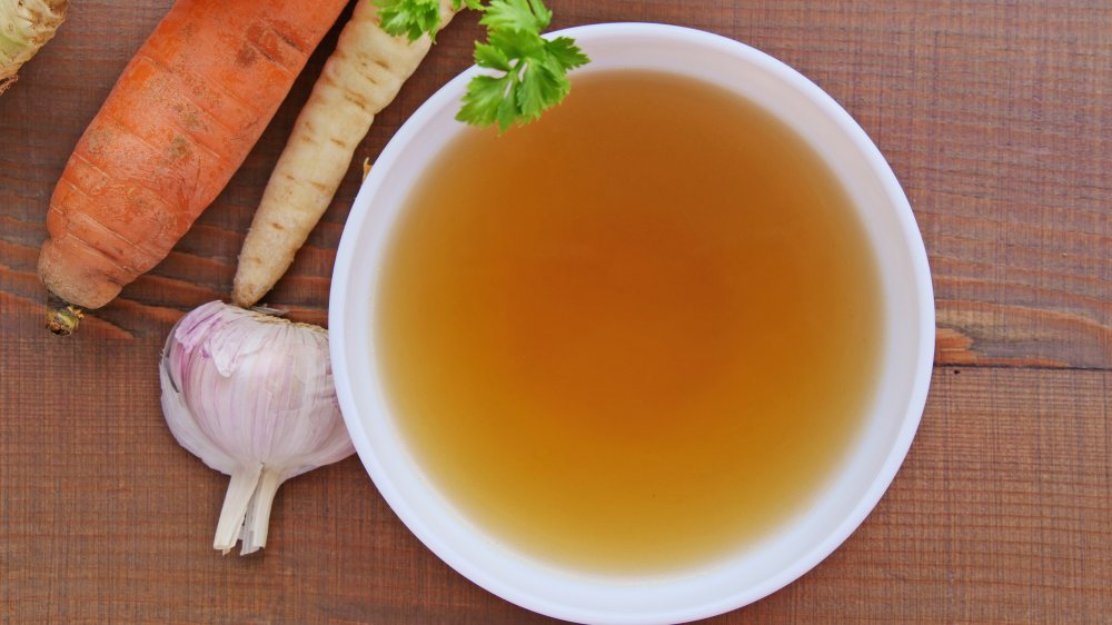 Clear soup with a side of vegetable