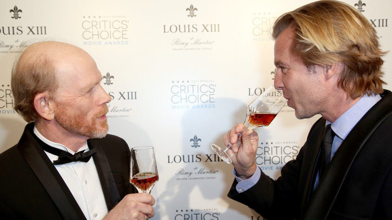 Ron Howard (left) holds cognac