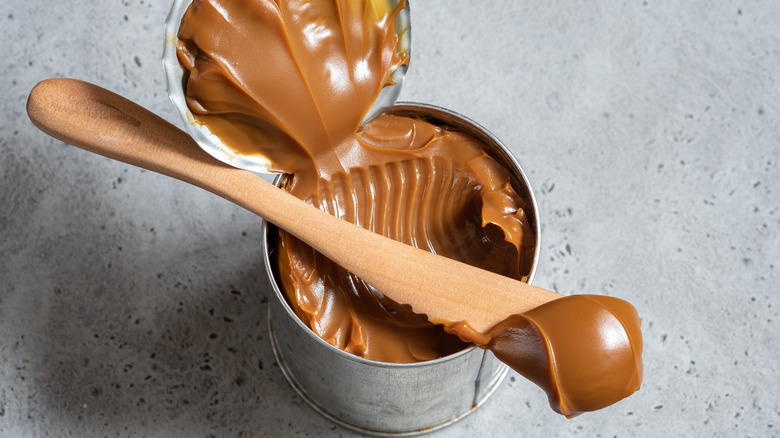 Condensed milk cooked in can to become caramel sauce