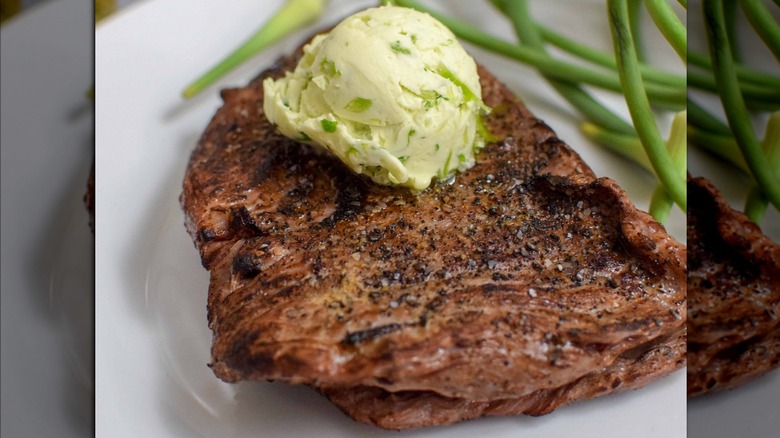 Grilled steak with compound butter