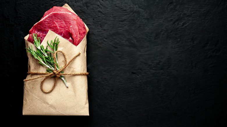 Brown paper-wrapped steak