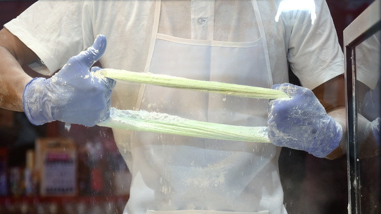 Dragon beard's candy being pulled