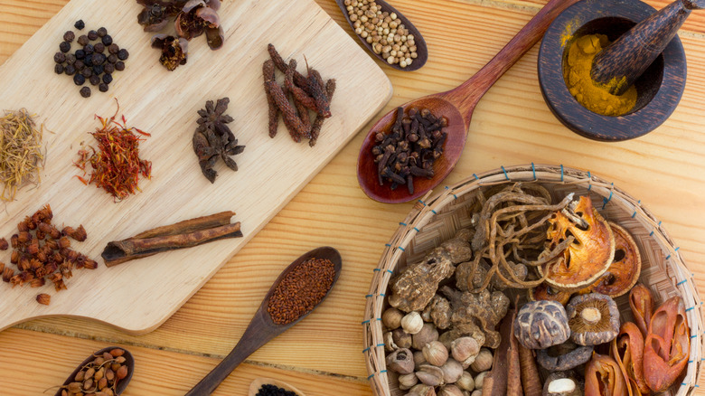 Traditional chinese medicine displayed on wooden surface