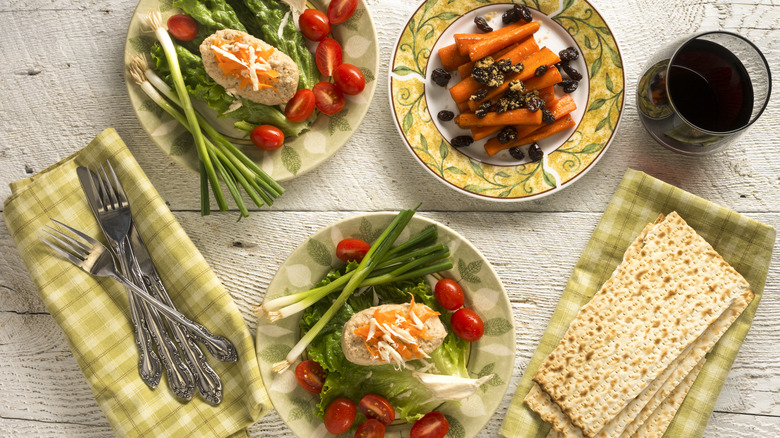 Gefilte fish, carrots, matzoh, wine