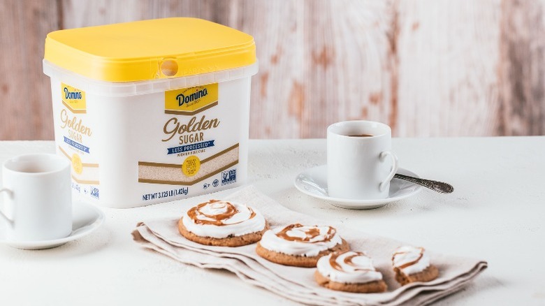 Golden sugar with cinnamon rolls and coffee