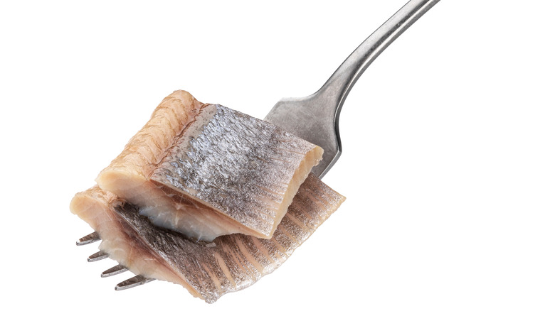 Herring on fork