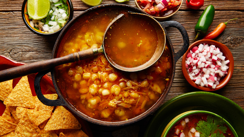 Bowl of pozole with toppings