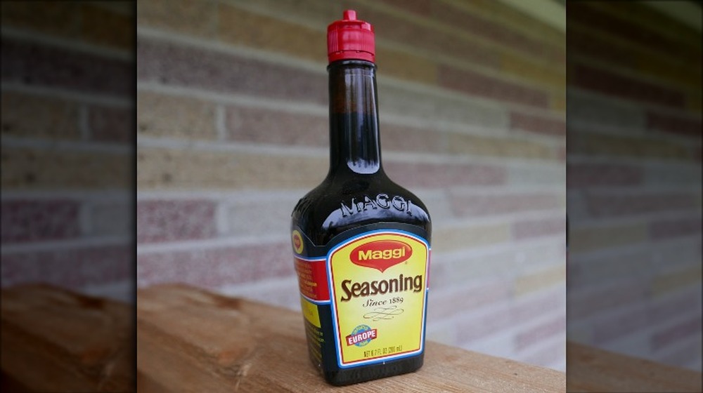 Maggi bottle with brick background