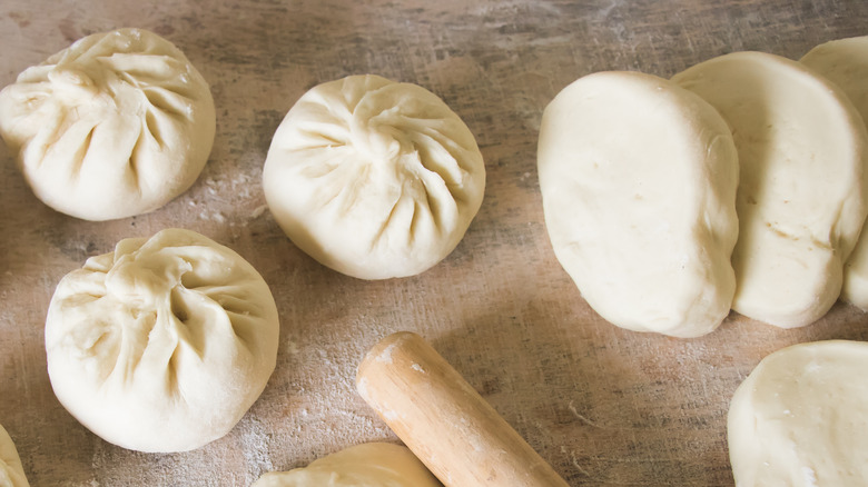 Steam bun dough shaped into bao