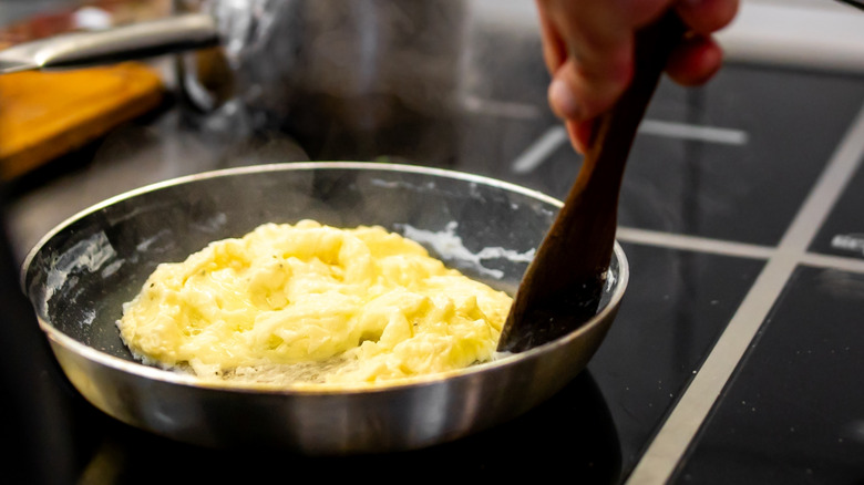 Eggs being cooked on stove