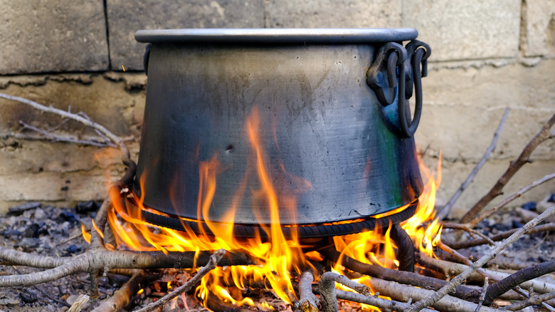 Molasses pot over wood fire